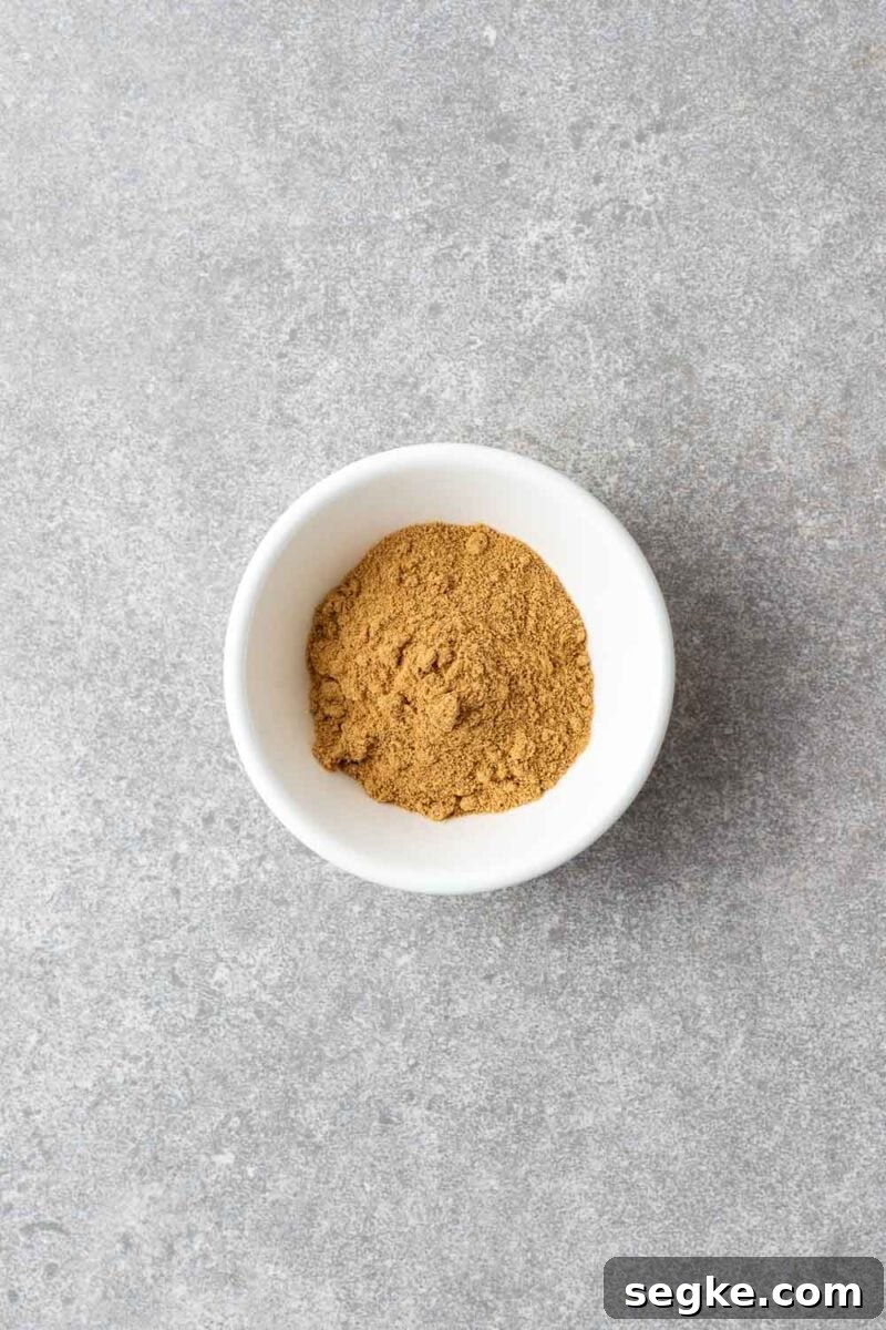 Shichimi Togarashi: Authentic Japanese Seven-Spice Seasoning 7 Ground ginger in a small white bowl.