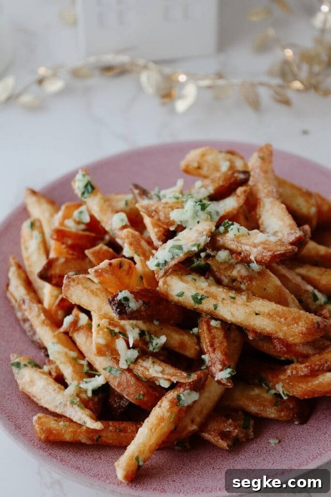 Crispy Truffle Fries with Parmesan 2 Truffle french fries on a plate