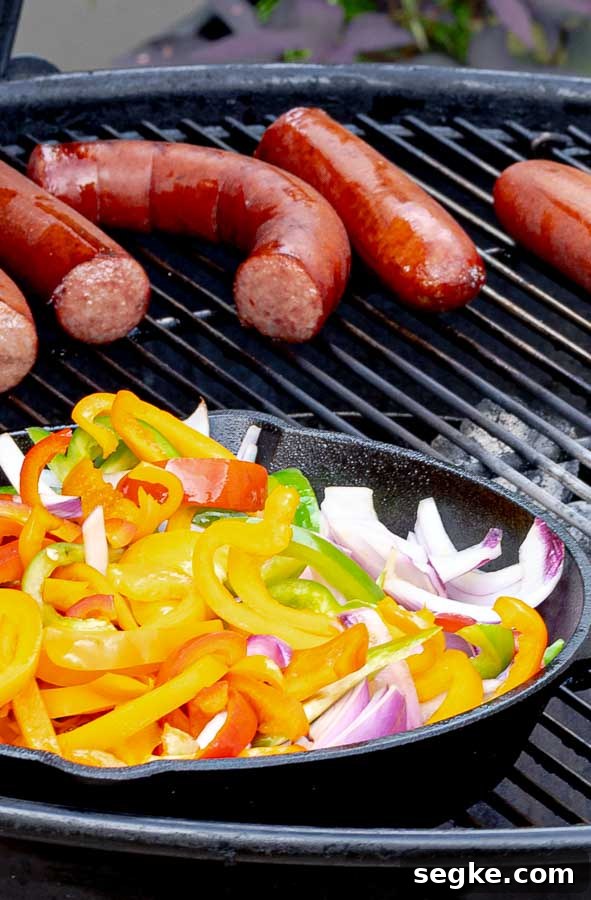 Grilled Sausage with Peppers and Onions Recipe 5 Grilled Sausage with Peppers and Onions on a barbecue grill