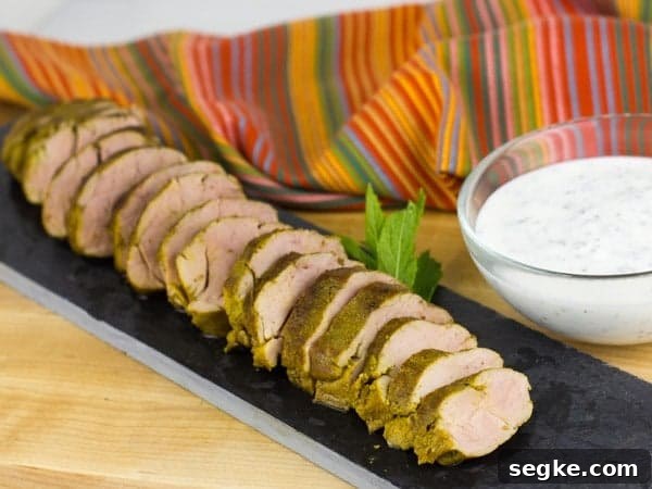 Curry-Rubbed Pork Tenderloin Recipe with Mint Yogurt Sauce 2 Curried Pork Tenderloin with Smoked Yogurt and Mint Sauce-4