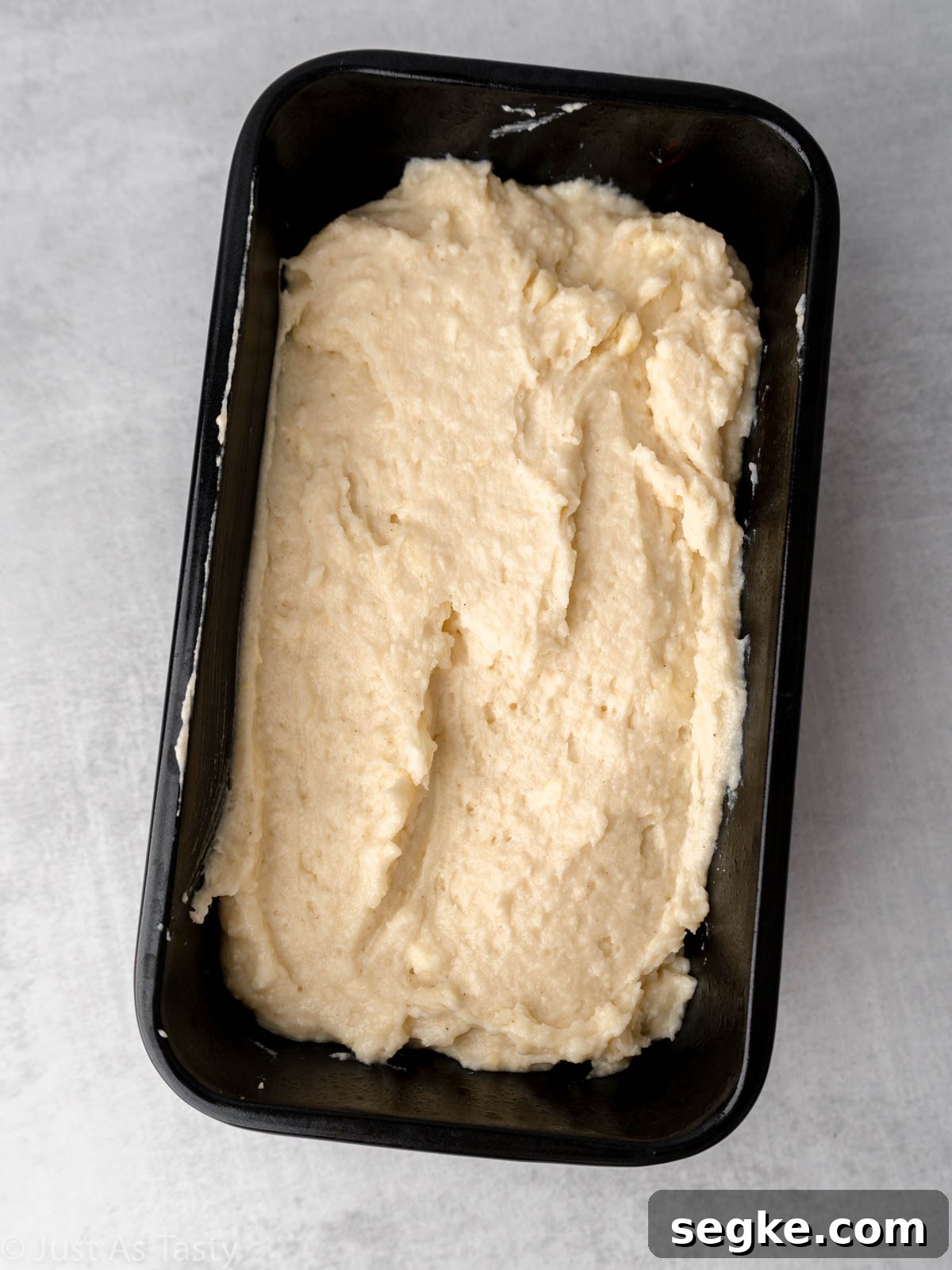 Moist Gluten-Free Coconut Cake Recipe 9 Cake batter in loaf pan.