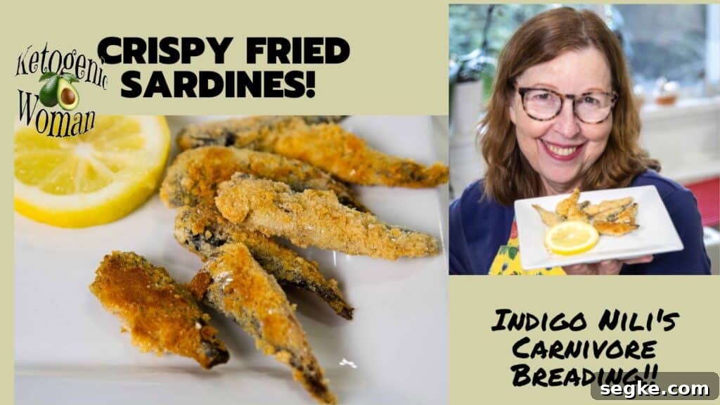 Breaded Sardines on white plate with lemon