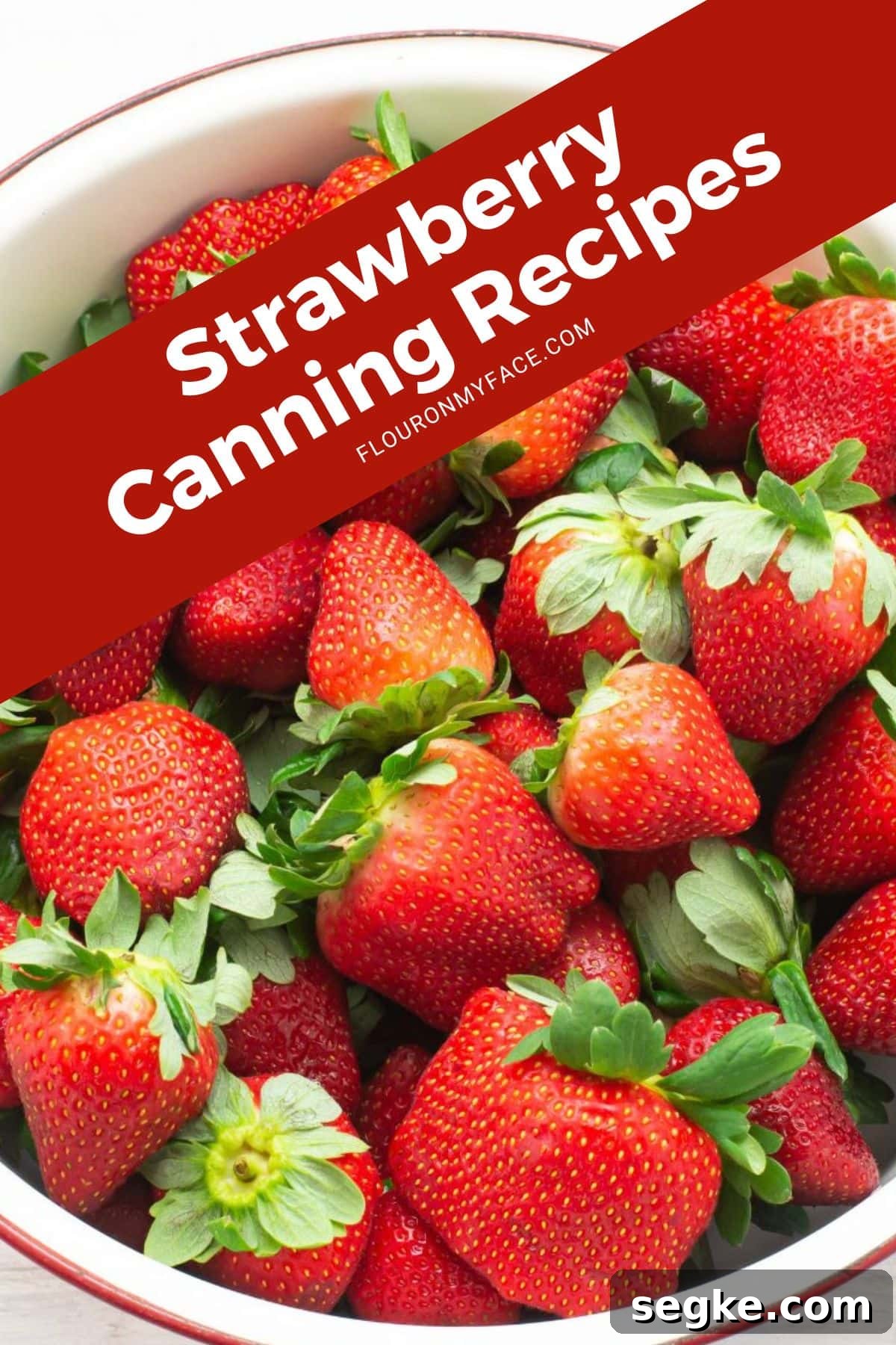 How to Can Strawberries: Recipes and Canning Tips 2 Large image of fresh strawberries in a colander.