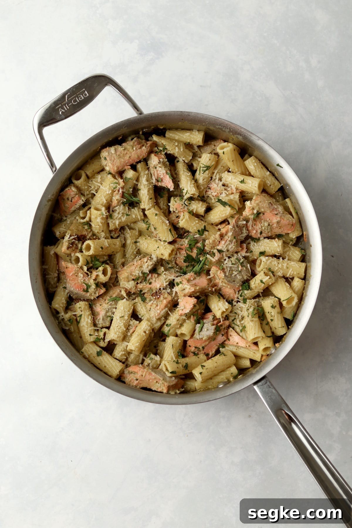 salmon pesto pasta in pan.