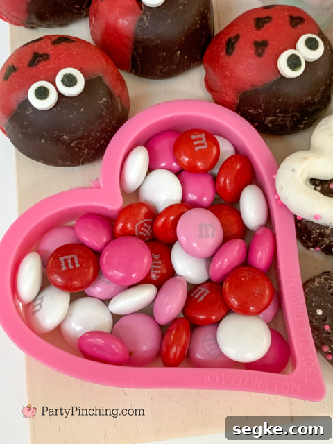 Valentine Charcuterie, best charcuterie ideas, Valentine treat ideas, cute charcuterie boards, heart charcuterie, heart treats, best kids valentine's day ideas, best valentine recipes, easy valentine recipes, easy charcuterie ideas