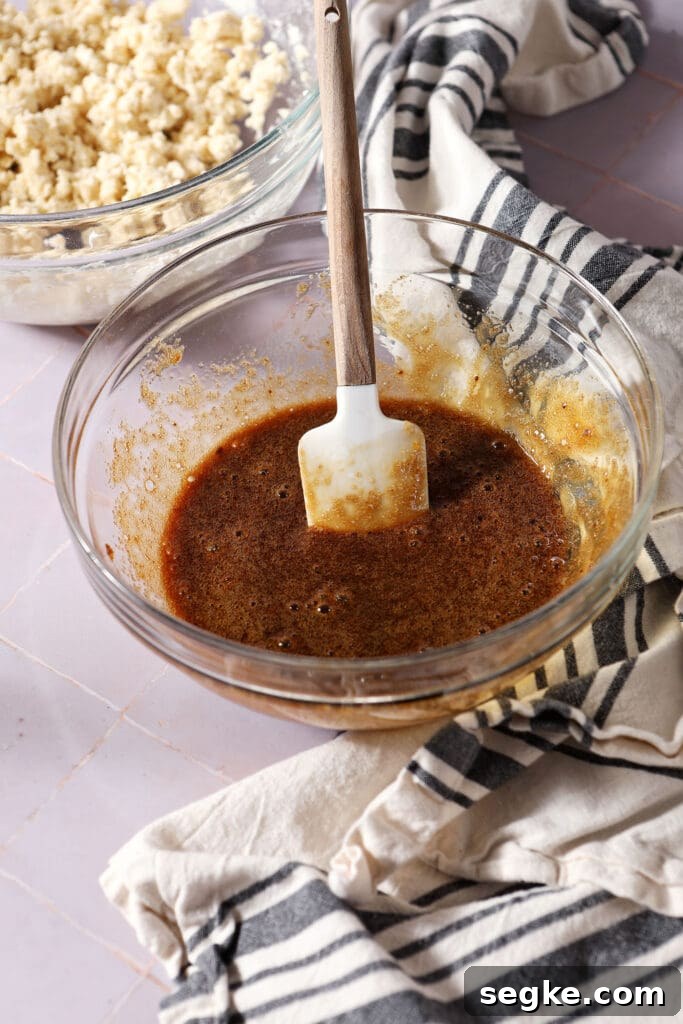 mixed egg and brown sugar in a bowl