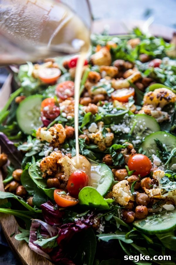 Smoky Roasted Cauliflower and Chickpea Salad 5 Salad close-up with roasted cauliflower, chickpeas, and feta