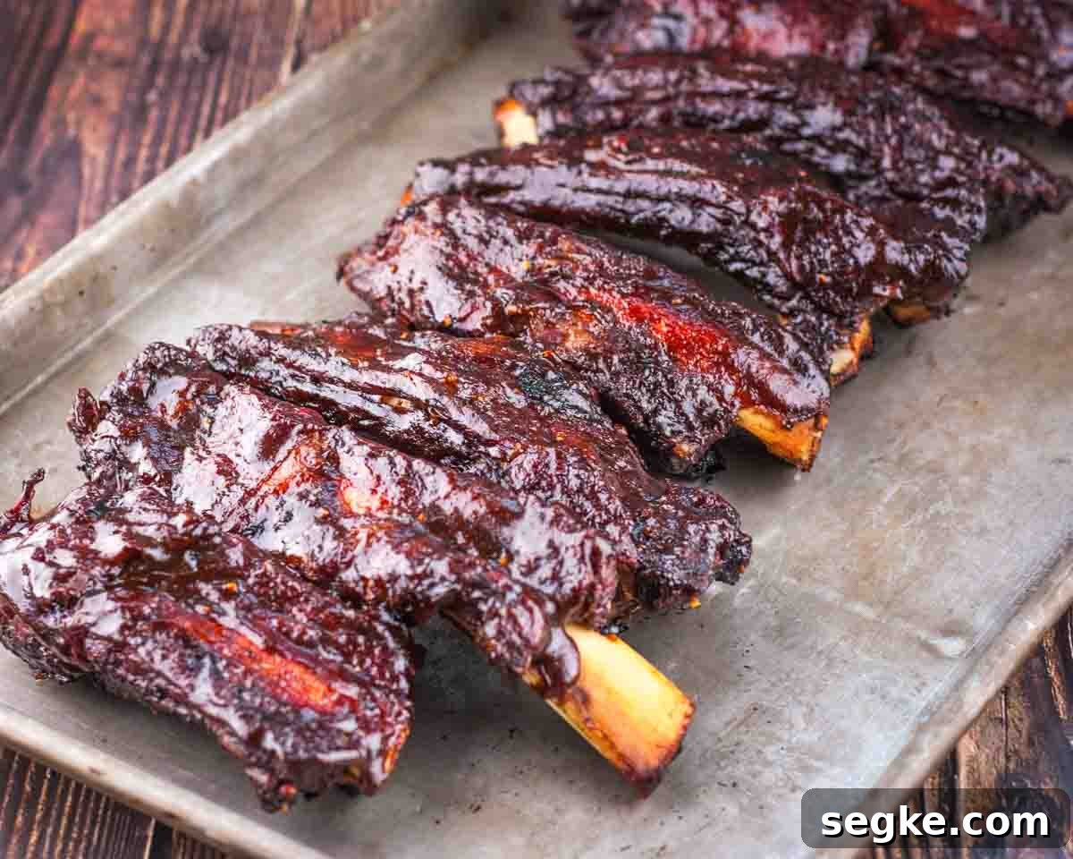 How to Smoke Beef Back Ribs on a Pellet Grill 15 The smoked beef ribs placed on a rimmed baking sheet, ready to serve.