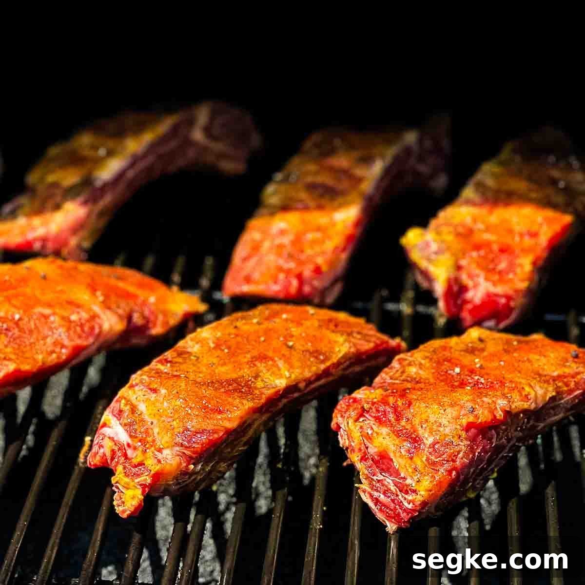 How to Smoke Beef Back Ribs on a Pellet Grill 9 The prepared ribs on the grill grates of the pellet grill.