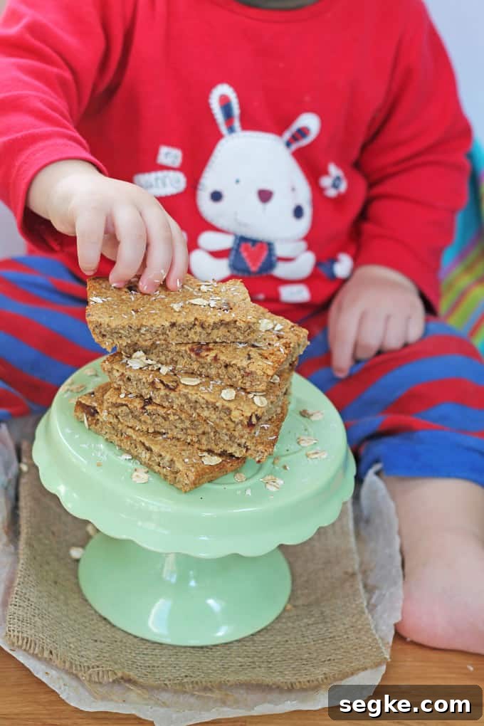 Banana and Orange Oat Bites: Toddler Snack Recipe 7 Sugar Free Flapjacks or Oat Bars for baby led weaning | My Fussy Eater blog