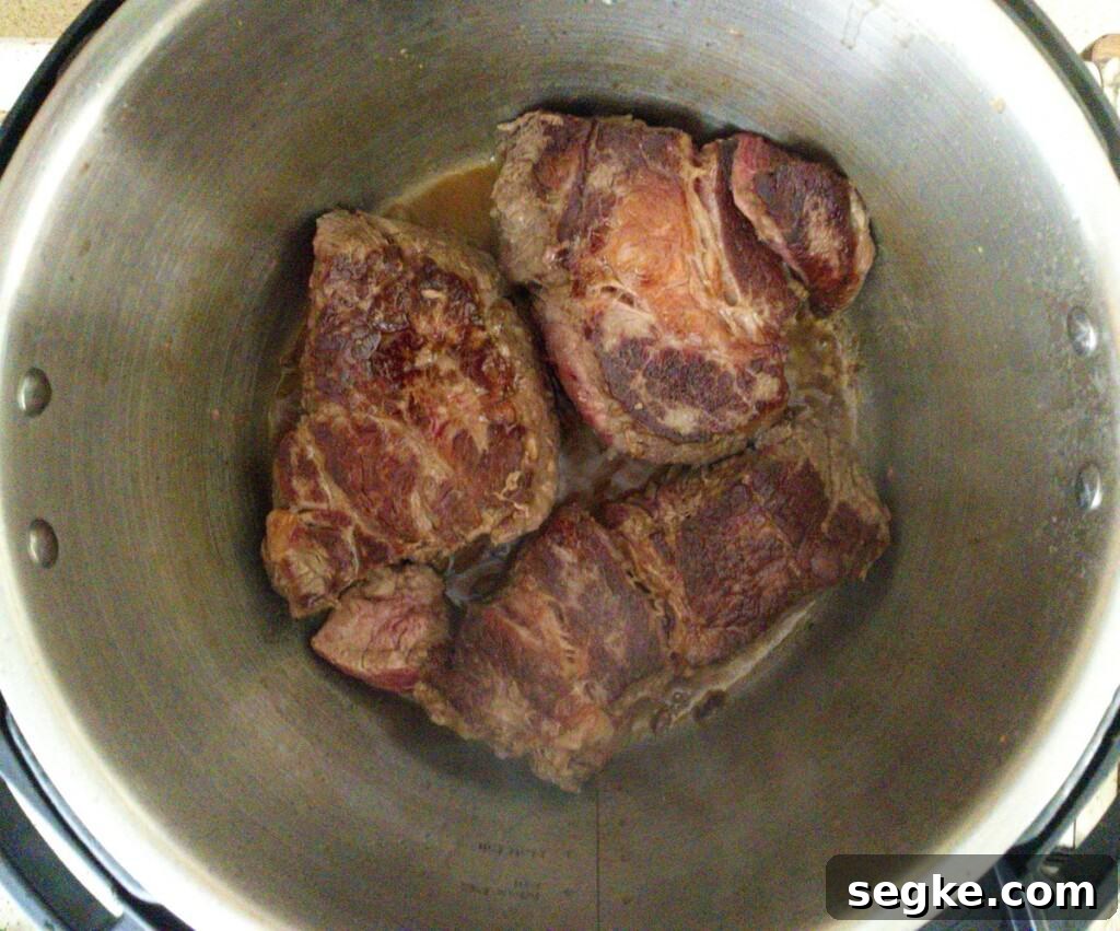 Instant Pot Mississippi Pot Roast Recipe (Juicy & Tender) 6 Mississippi pot roast step 3 in the instant pot searing both sides