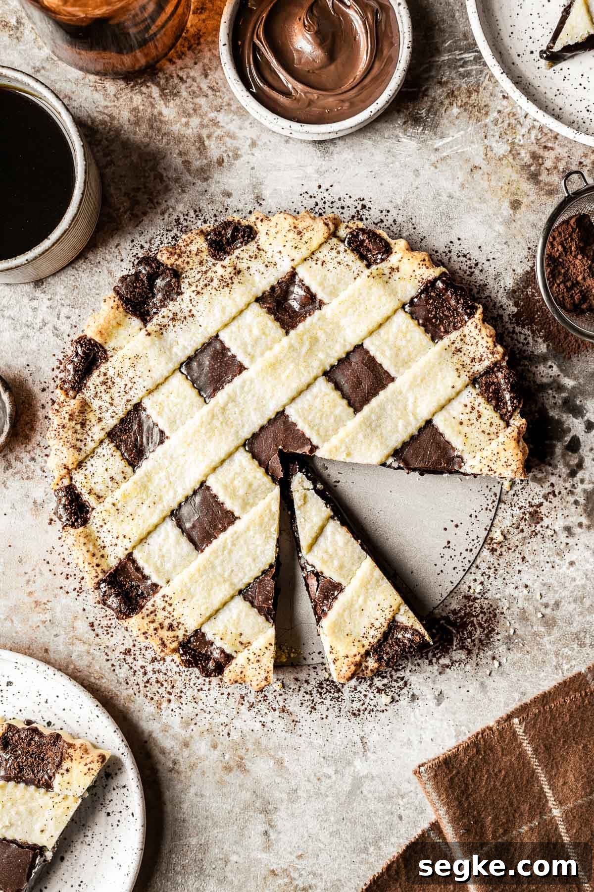 Nutella Crostata: Italian Hazelnut Chocolate Tart Recipe 2 Crostata alla Nutella with a few slices removed