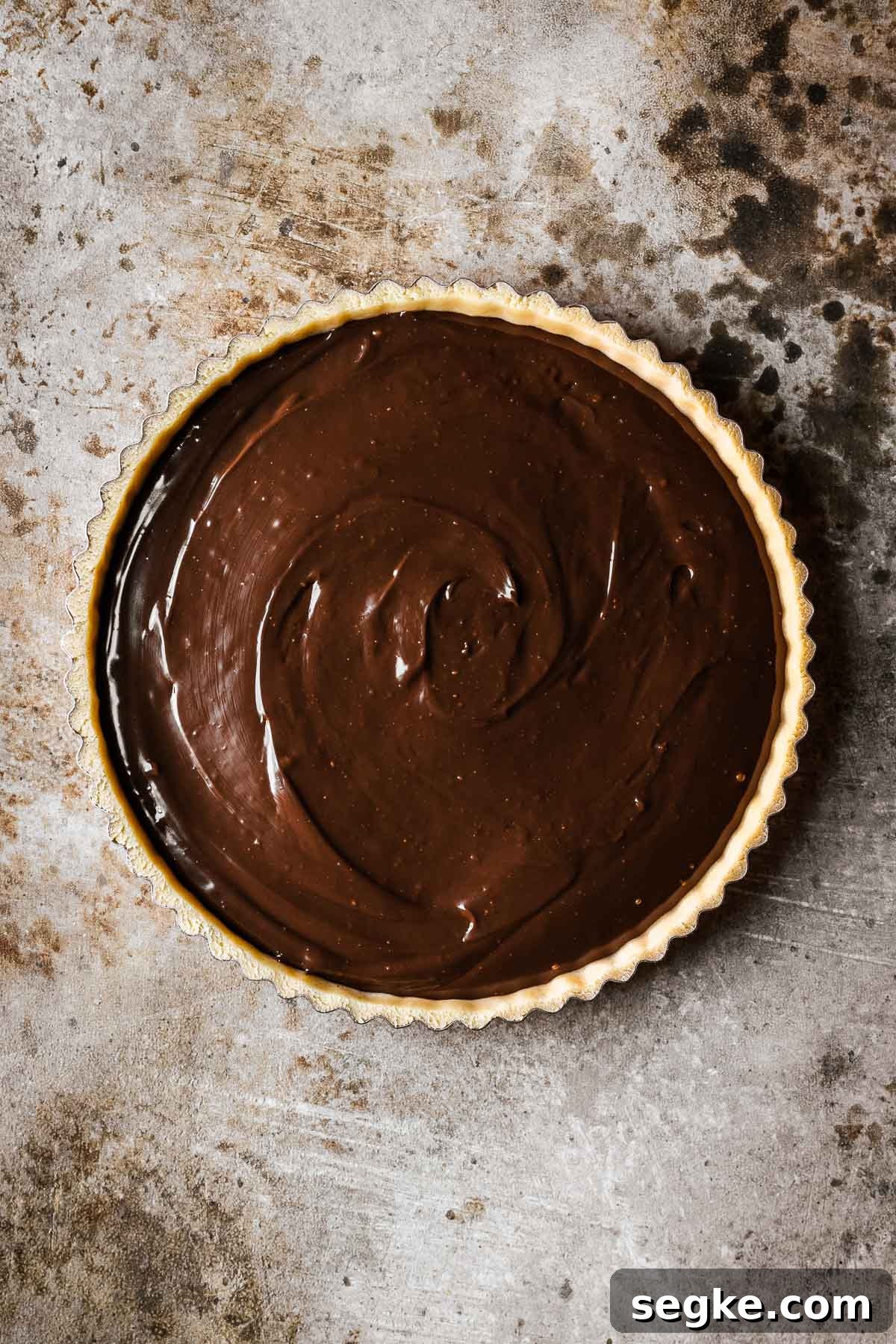 Nutella Crostata: Italian Hazelnut Chocolate Tart Recipe 15 An unbaked tart shell with chocolate hazelnut filling