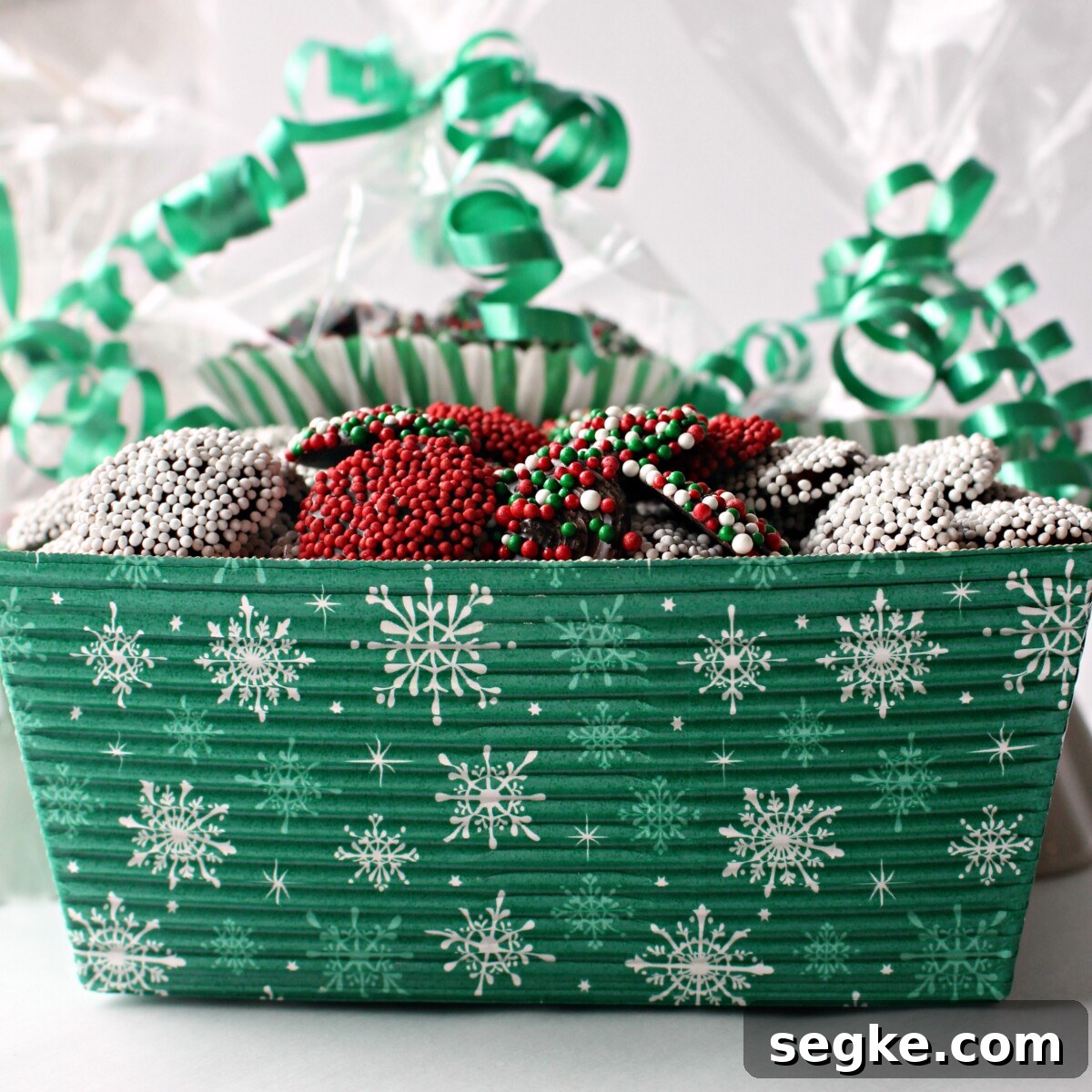 Chocolate Nonpareils: Classic Sprinkle Candy 5 Candies in a green gift box with a snowflake pattern.