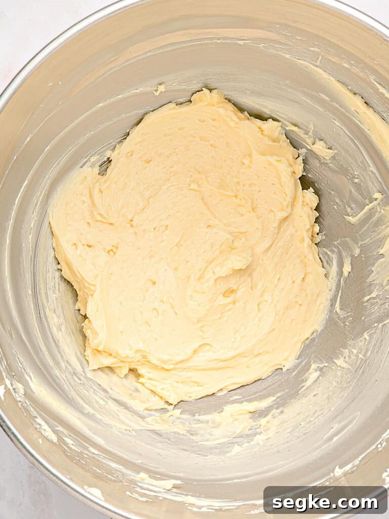 Whipped Honey Butter Recipe in 5 Minutes 4 Metal bowl with whipped honey butter.