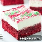 Christmas Red Velvet Poke Cake Recipe 9 Christmas Red Velvet Cheesecake Brownies - Featured Image