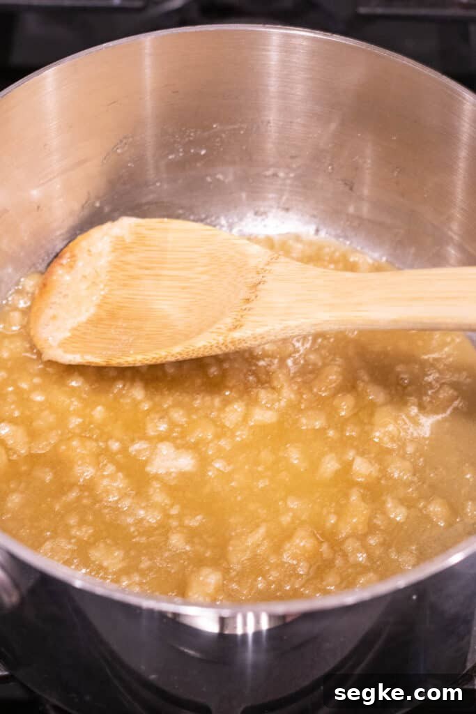 sugar turning brown and melting in saucepan