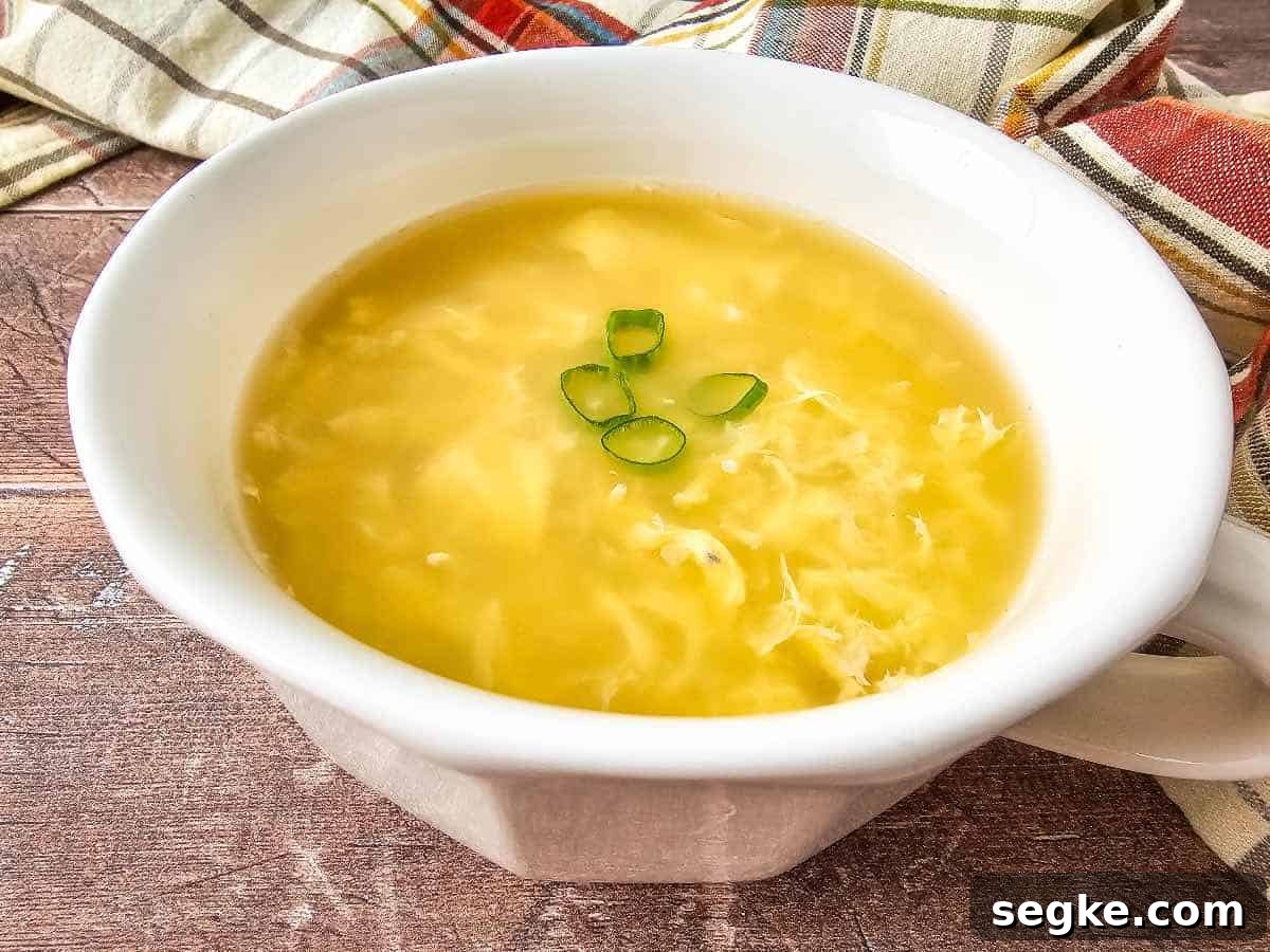 Silky Classic Chinese Egg Drop Soup Recipe 2 Egg Drop Soup in white bowl