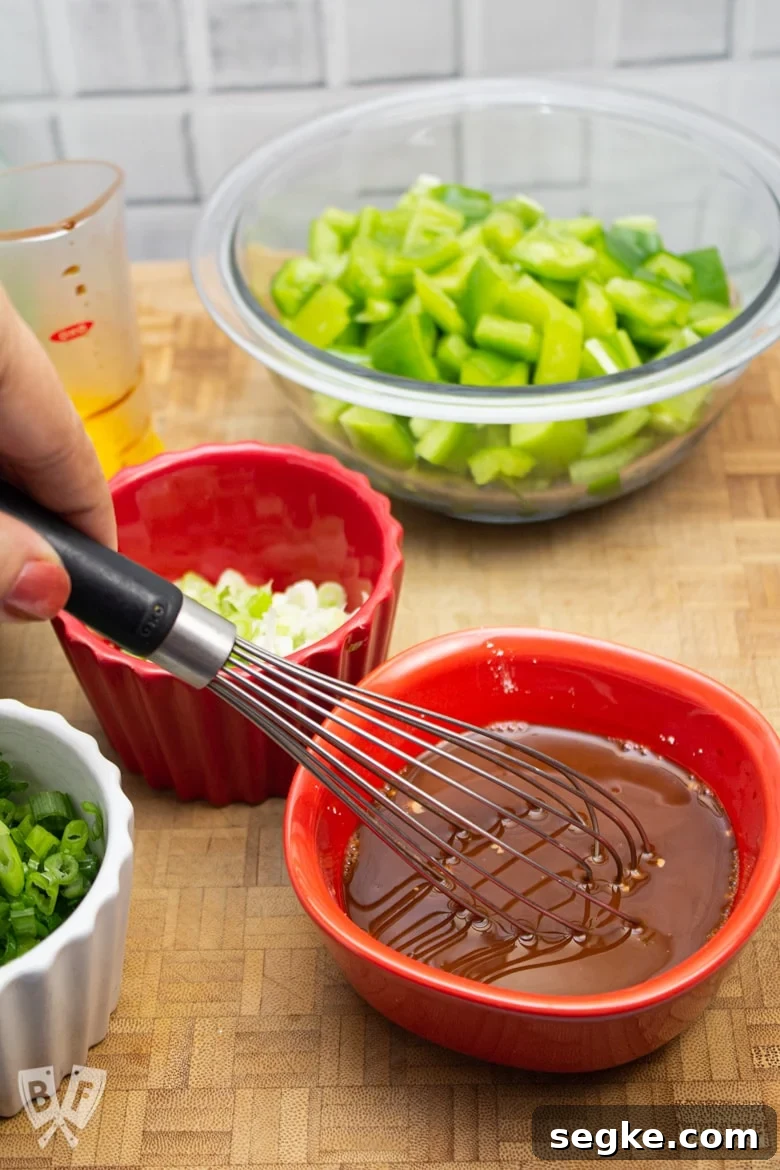 Soy-Ginger Chicken and Bell Pepper Stir-Fry 5 Whisking together soy sauce and cornstarch in a small bowl.