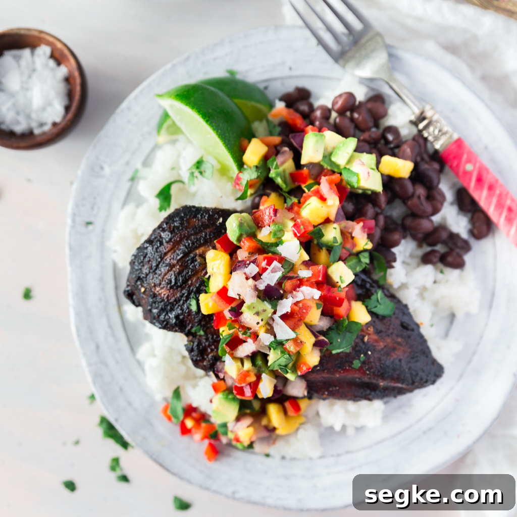 19 Authentic Jamaican Recipes to Try at Home 14 Jerk Chicken And Mango Avocado Salsa